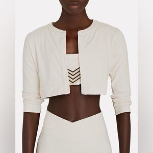 WEWOREWHAT
CROPPED CARDIGAN
JERSEY KNIT
Size: (L) Color: OFF WHITE